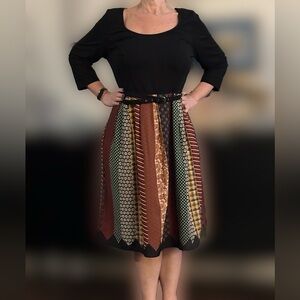 Eshakti top dress with tie design lined skirt. Matching belt included. 1X 18W